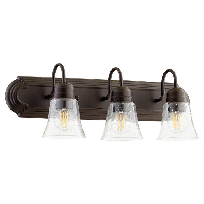 Quorum Home Quorum - 5094-3-286 - Three Light Vanity - Oiled Bronze w/ Clear/Seeded