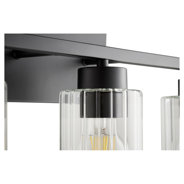 Quorum Home Quorum - 501-3-69 - Three Light Vanity - Textured Black w/ Clear Fluted Glass