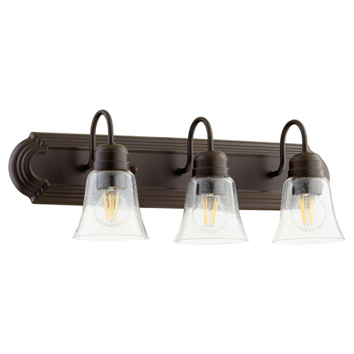Quorum Home Quorum - 5094-3-286 - Three Light Vanity - Oiled Bronze w/ Clear/Seeded